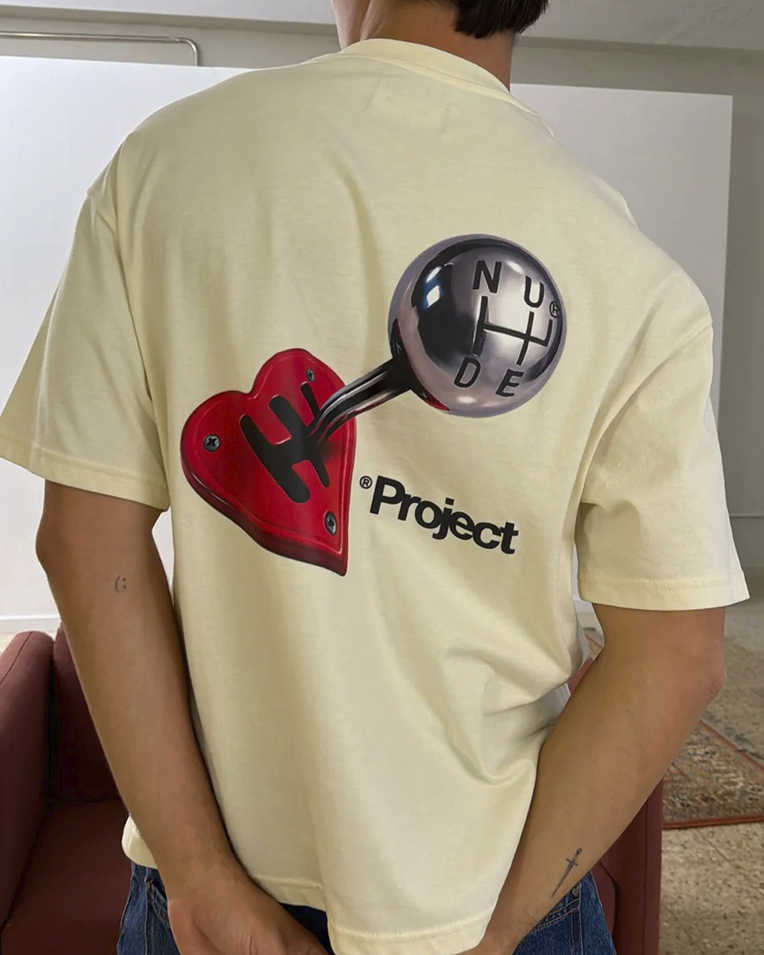 Футболка унісекс Nude Project бавовна молочна з принтом clutch-tee-marshmallow Футболка унісекс Nude Project бавовна молочна з принтом clutch-tee-marshmallow