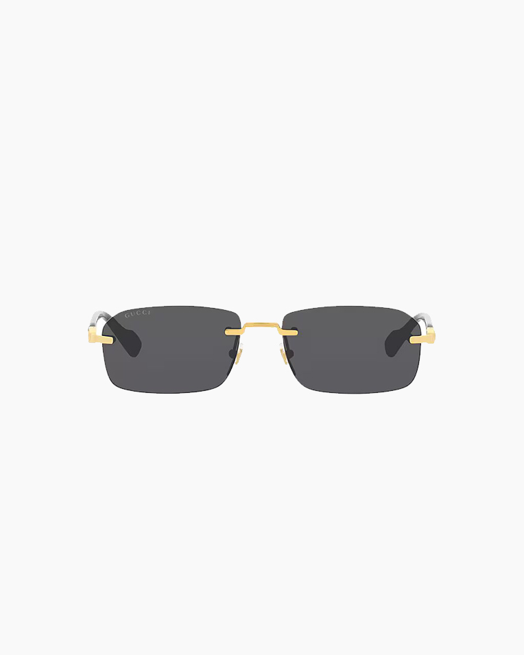 Солнцезащитные очки прямоугольные Gucci Eyewear Rectangle-Frame в золотой оправе GG1221