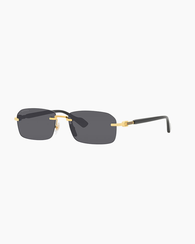 Солнцезащитные очки прямоугольные Gucci Eyewear Rectangle-Frame в золотой оправе GG1221