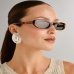 Сонцезахисні окуляри котяче око Saint Laurent Shade SL 557 у коричневій оправі 889652408415