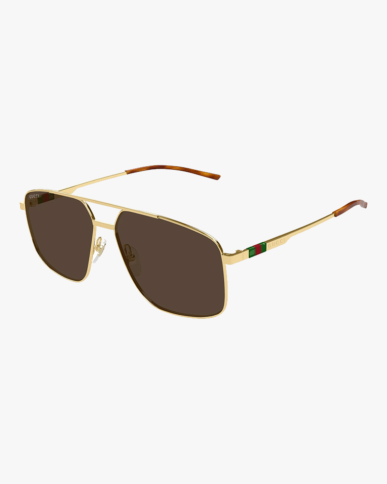 Солнцезащитные очки авиаторы Gucci в золотой оправе с коричневой линзой GG 1676S 002