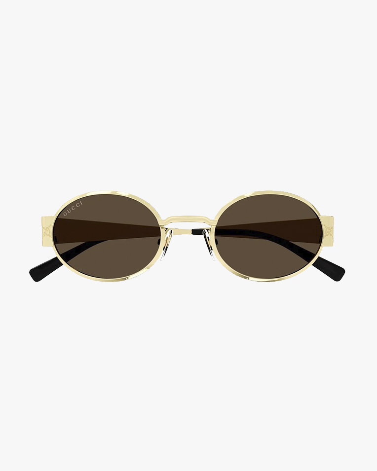 Солнцезащитные очки круглые Gucci в золотой оправе с коричневой линзой GG1854S 005