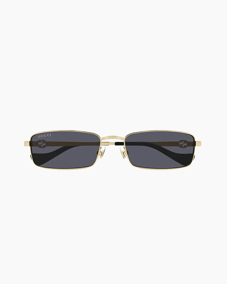Солнцезащитные очки прямоугольные Gucci Eyewear Rectangle-Frame в золотой оправе GG1600S-001