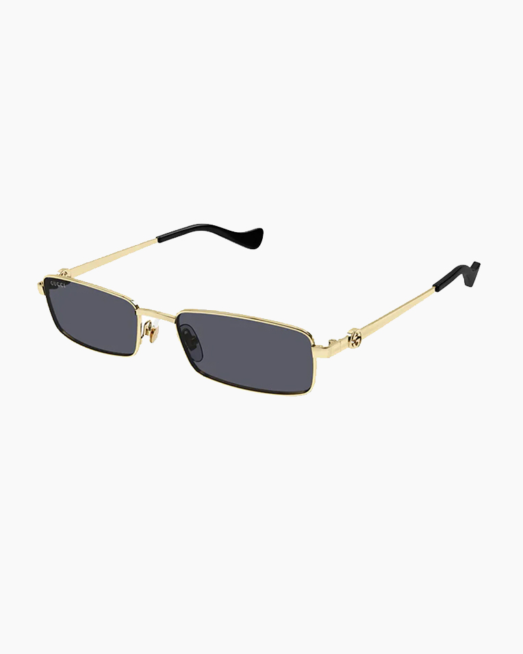 Солнцезащитные очки прямоугольные Gucci Eyewear Rectangle-Frame в золотой оправе GG1600S-001