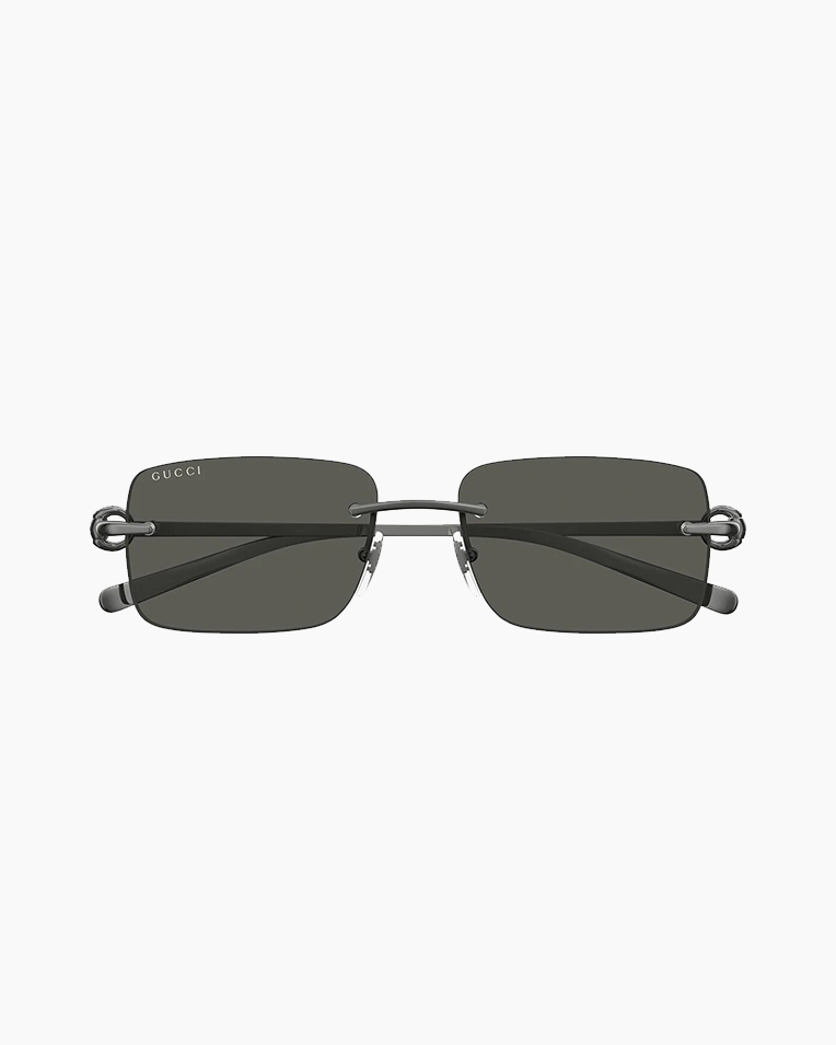 Солнцезащитные очки прямоугольные Gucci Rimless в серой оправе GG1703-001