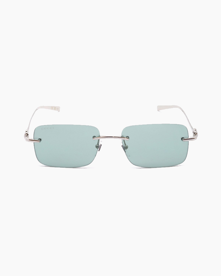 Солнцезащитные очки прямоугольные Gucci Rimless в серебрянной оправе  GG1703-002