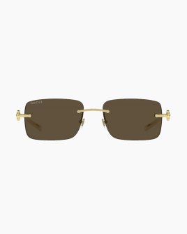 Сонцезахисні окуляри прямокутні Gucci Rimless у золотій оправі GG1703-004