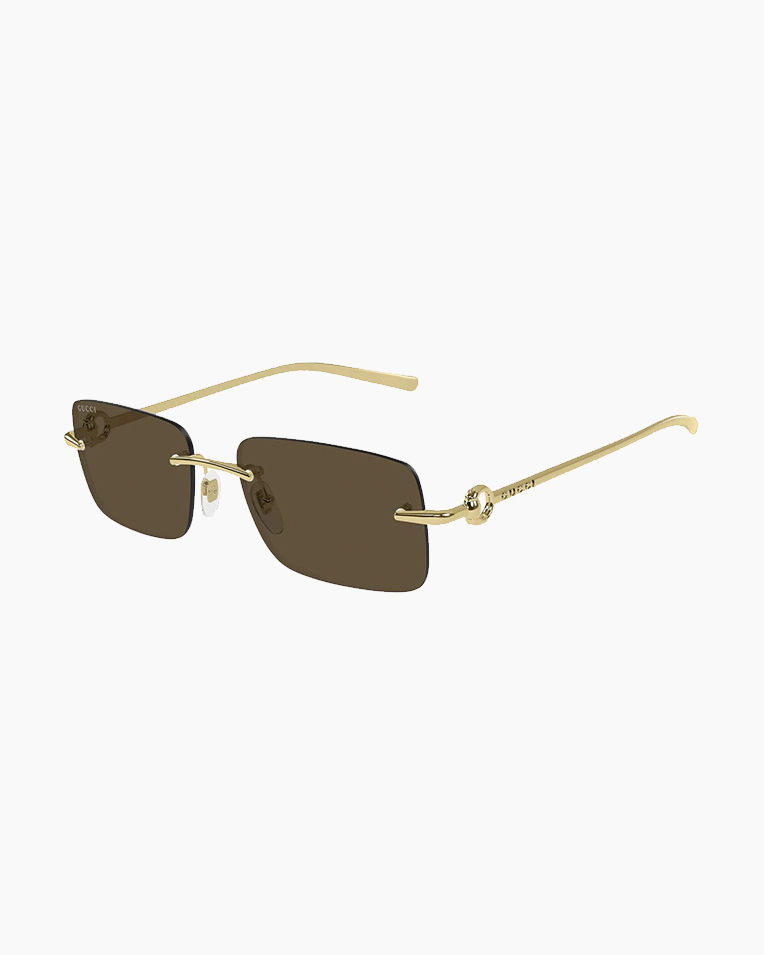 Солнцезащитные очки прямоугольные Gucci Rimless в золотой оправе GG1703-004 