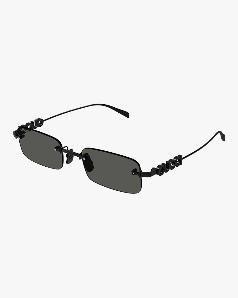Солнцезащитные очки прямоугольные Gucci без оправы с черной линзой GG1808S 001