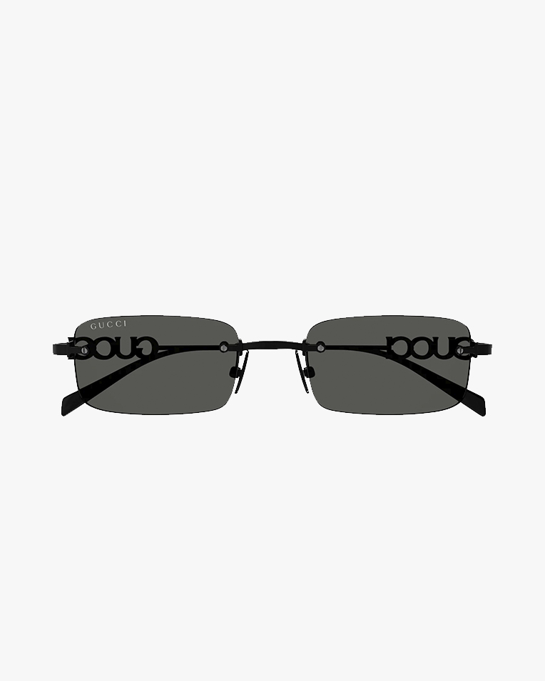 Солнцезащитные очки прямоугольные Gucci без оправы с черной линзой GG1808S 001