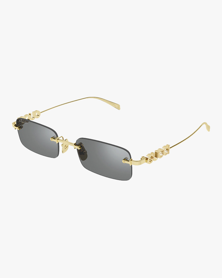 Солнцезащитные очки прямоугольные Gucci без оправы с серой линзой GG1808S 003