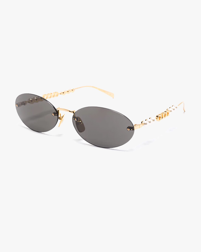 Солнцезащитные очки овальные Gucci Eyewear без оправы GG1922S