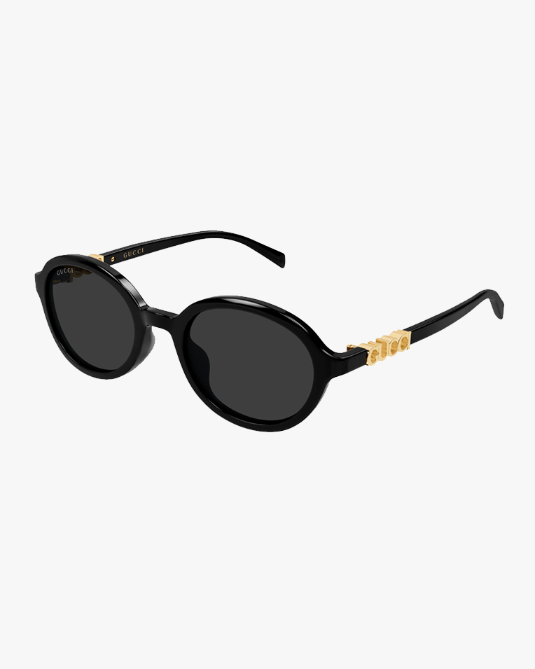 Солнцезащитные очки овальные Gucci в черной оправе с серой линзой GG2033SA 001