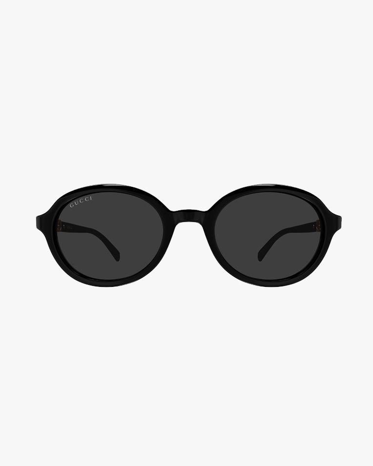Солнцезащитные очки овальные Gucci в черной оправе с серой линзой GG2033SA 001