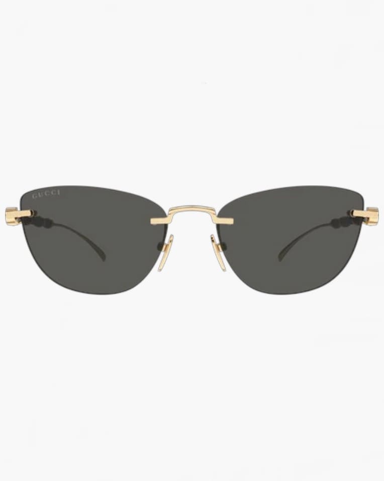 Солнцезащитные очки кошачий глаз Gucci без оправы с серой линзой  GG2063S 002